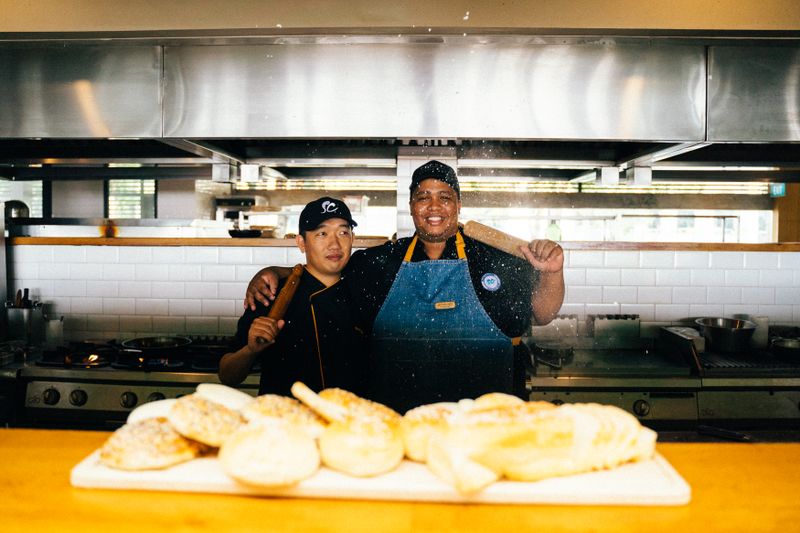 Wing Snob founders in the kitchen crafting bold wing flavors