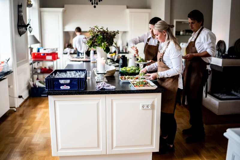 Wing Snob team preparing fresh ingredients with care and precision